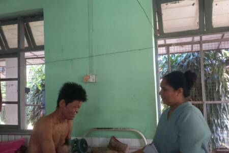 Chaplain visiting leper patient