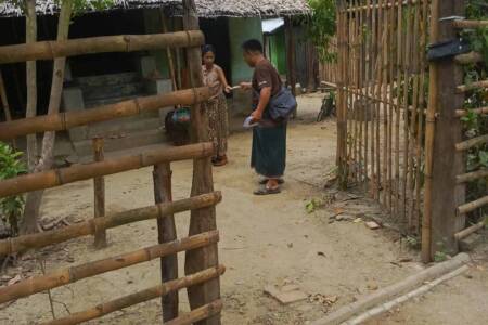 Sharing Gospel tract with Karen villager