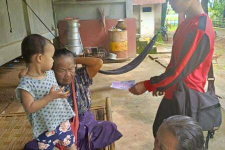 Distributing Gospel Karen village