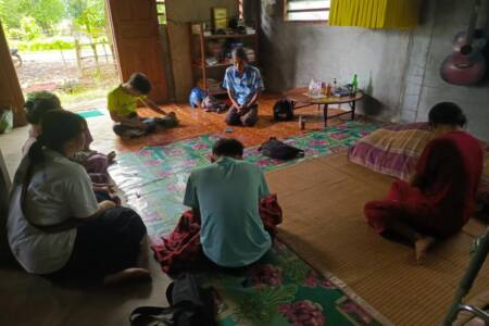 Praying with Karen family