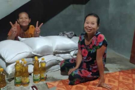 Happy ladies receiving food