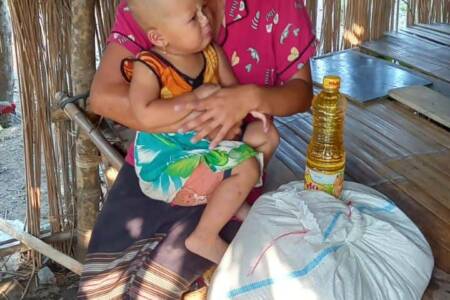 Mom and son receiving food