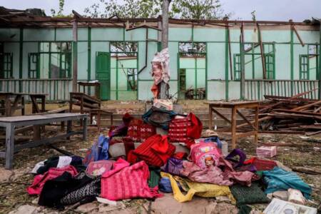Students' bags are kept in front of a school building damaged in a bombardment carried out by Myanmar's military at the Ohe Htein Twin village in Tabayin township, Sagaing Region, on May 12, 2025. A Myanmar junta airstrike hit a school on May 12 killing 22 people, including 20 children, witnesses said, despite a purported humanitarian ceasefire called to help the nation recover from a devastating earthquake. (Photo by AFP)